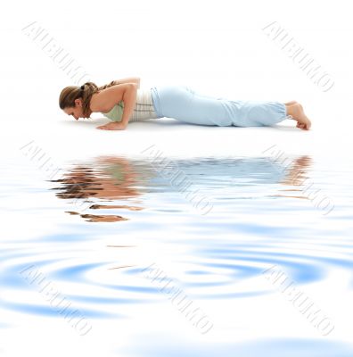 four-limbed staff pose on white sand 2