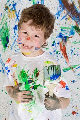 Boy playing with painting Boy playing with painting