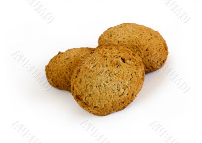 Three oatmeal cookies with raisins