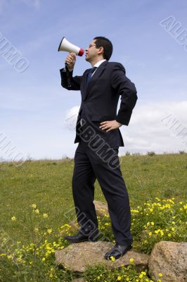 Businessman speaking with a megaphone