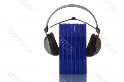headphones holding blue cases