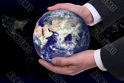 earth in a hands, night city earth in a hands, night city