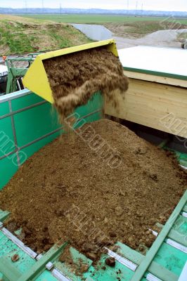Tractor charges biogas plant Tractor charges biogas plant