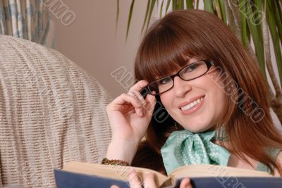 Cute girl reading book