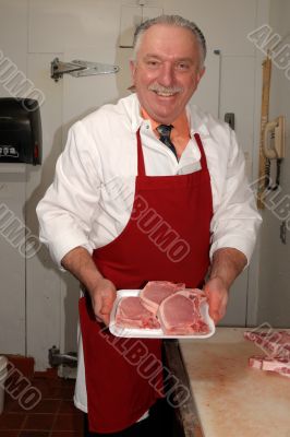 Butcher shows pork chops