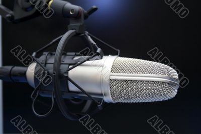 Radio mic on dark background Radio mic on dark background