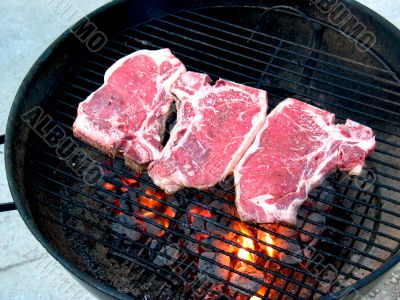 T-Bone Steaks on the Grill