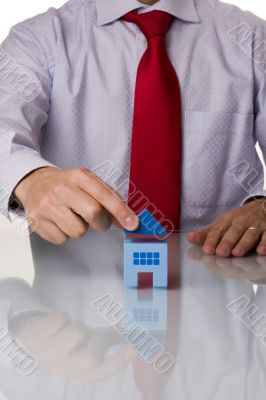 businessman selling a house