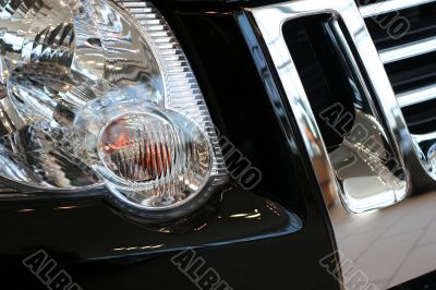 detail of new car in dealership showroom