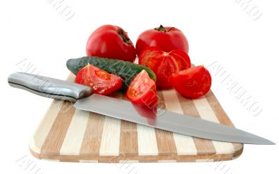 Vegetables on cutting board.