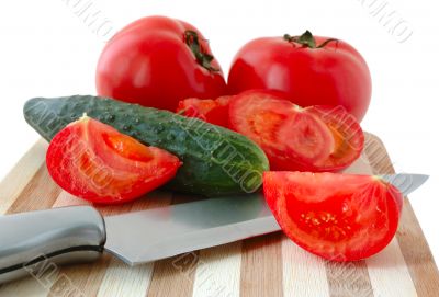 Vegetables on cutting board.