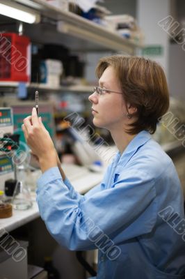 Scientist with syringe