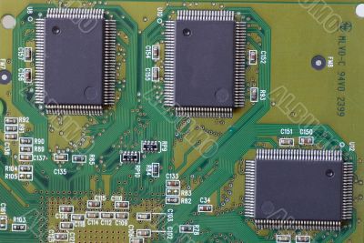 Close-up on a microchip on a scheme background