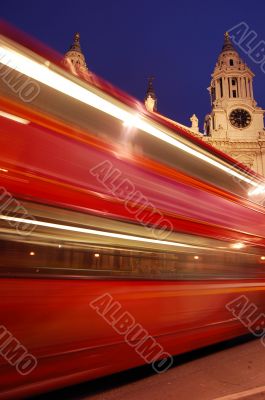 Blurred red London bus