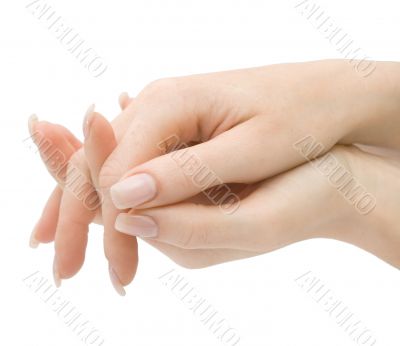 Woman hands with crossed fingers isolated with clipping path