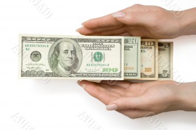 US Dollars in ladder in woman`s hand, isolated with clipping pat