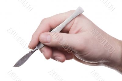 Hand with scalpel 1