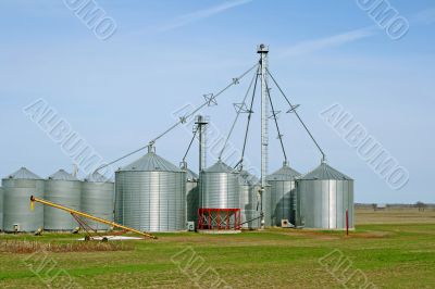 Grain silos on a farm in spring