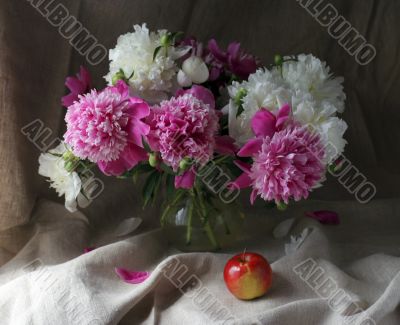 Flowers and apple