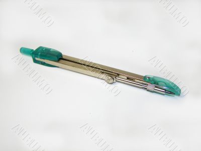 turquoise plastic knife on a white background