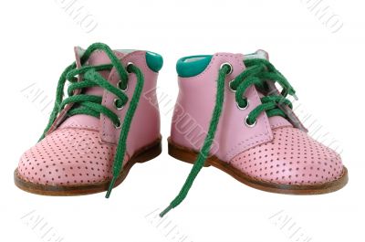 Pink leather baby`s boots.