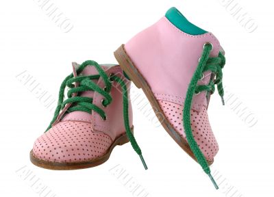 Pink leather baby`s boots.