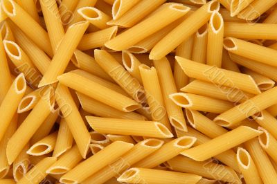 Penne rigate pasta background Penne rigate pasta background