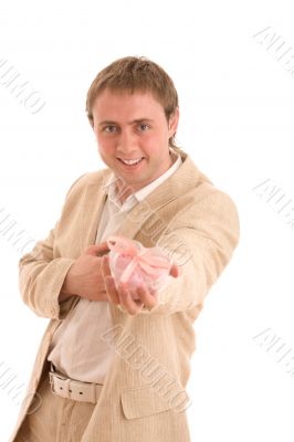 Smiling young man give a gift