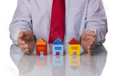 Real estate agent showing houses