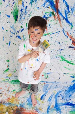 Boy playing with painting