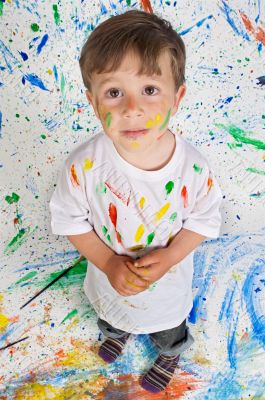 Boy playing with painting