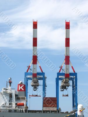container ship in a dock with  crane