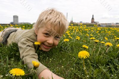 Boy playing in meadow Boy playing in meadow