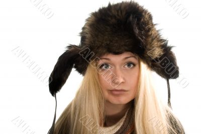 Beautiful girl in fur cap