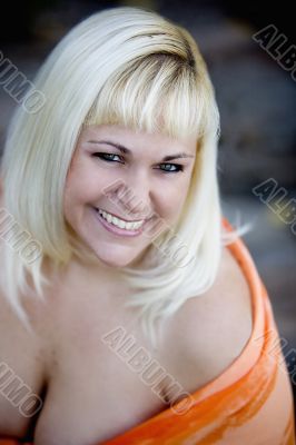 beautiful busty blonde smiling