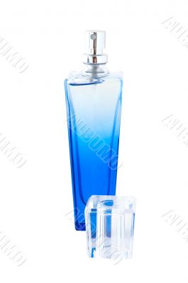 Perfume in deep blue scent-bottle.