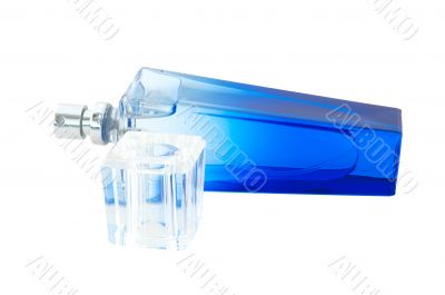 Perfume in deep blue scent-bottle.