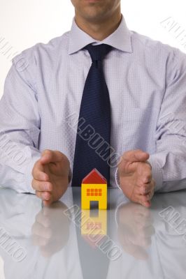 Real estate agent showing houses