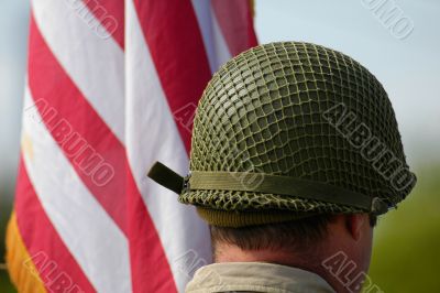 US helmet near United States of America flag