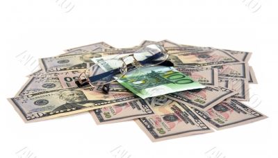 Dollars, euro and glasses Dollars, euro and glasses