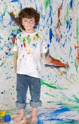 Boy playing with painting Boy playing with painting