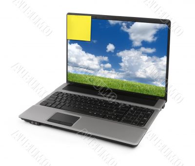 notebook with landscape and yellow note