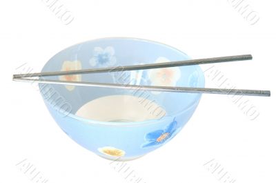 Blue cup and two steel chopsticks. Blue cup and two steel chopsticks.