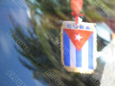 cuba flag behind glass