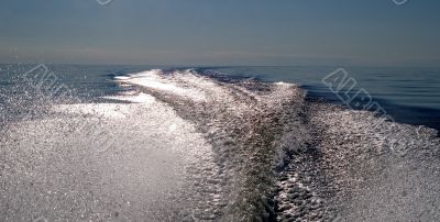 Trace from a boat on lake