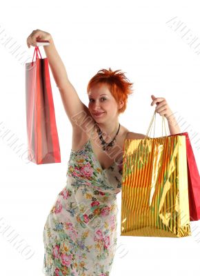 Shopping. Happy woman with different bags with purchases
