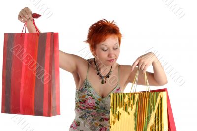 Shopping. Happy woman with different bags with purchases Shopping. Happy woman with different bags with purchases