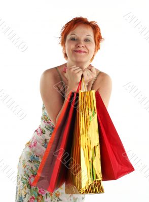 Shopping. Happy woman with different bags with purchases Shopping. Happy woman with different bags with purchases