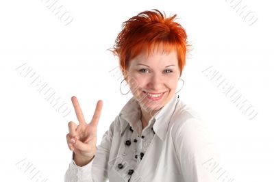 Happy lucky young woman with Victory gesture
