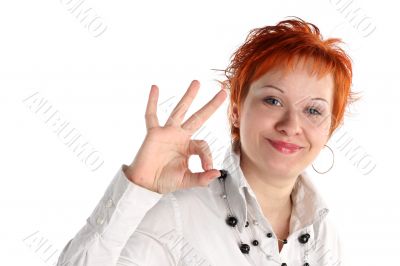 Happy lucky young woman with ok gesture